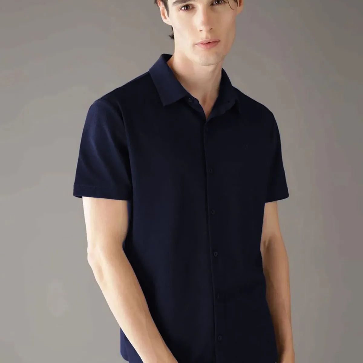 CALVIN KLEIN - Camisa azul manga corta de tejido interlock suave Calvin Klein