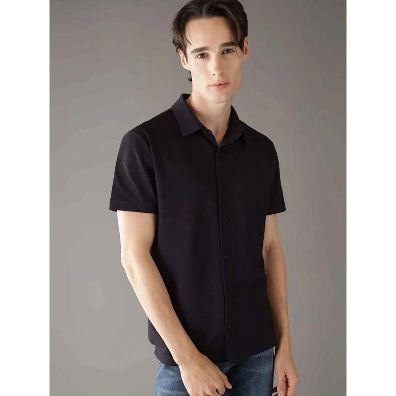 CALVIN KLEIN - Camisa negra manga corta de tejido interlock suave Calvin Klein