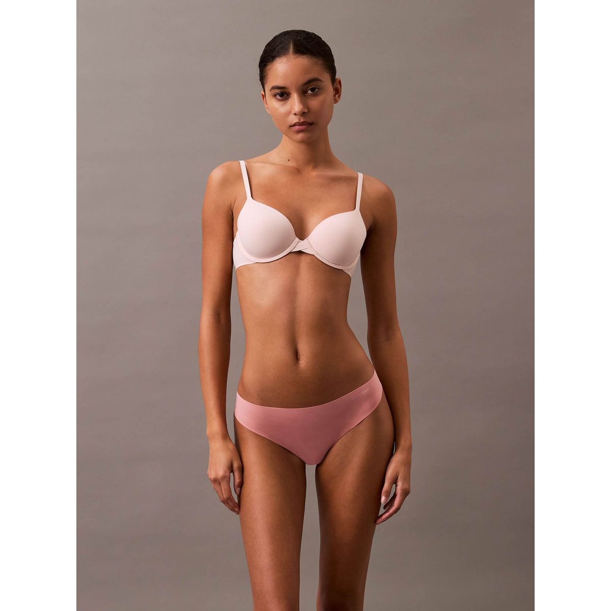 CALVIN KLEIN - Tanga rosada invisible con logo en el lateral Calvin Klein