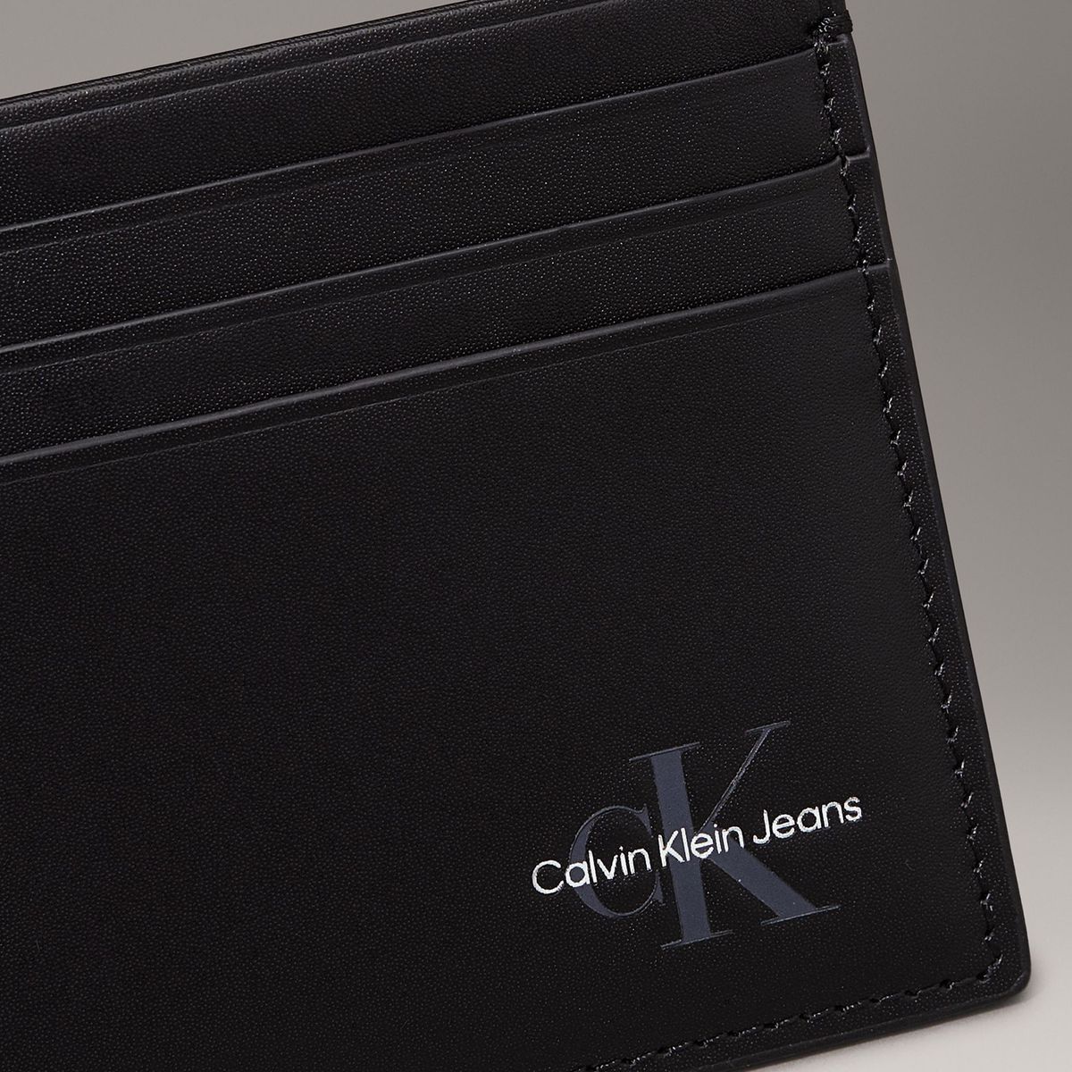 CALVIN KLEIN - Tarjetero negro con monograma Calvin Klein