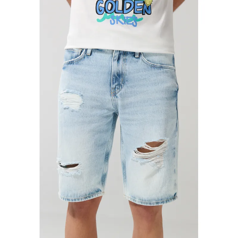 KOAJ - KOAJ Bermuda tiro bajo en jean slim azul con y rotos en fren Hombre