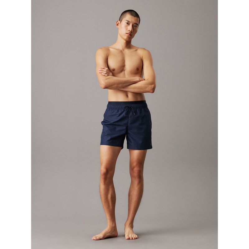 Traje azul de baño corto con cinturilla doble CK Meta Legacy