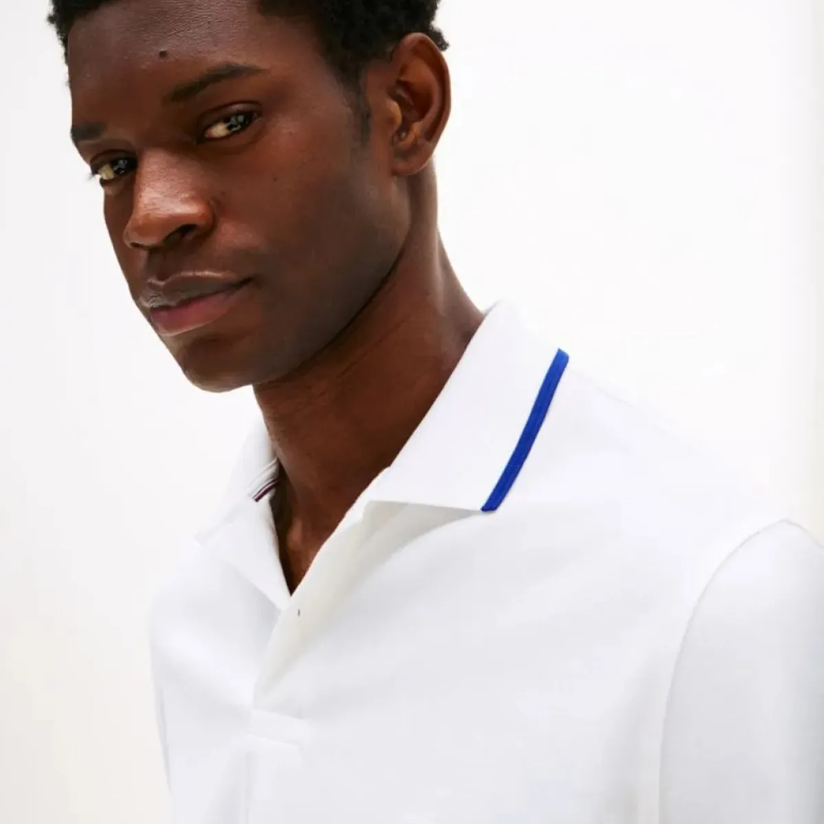 TOMMY HILFIGER - Polo blanco Performance de corte regular con ribete Tommy Hilfiger