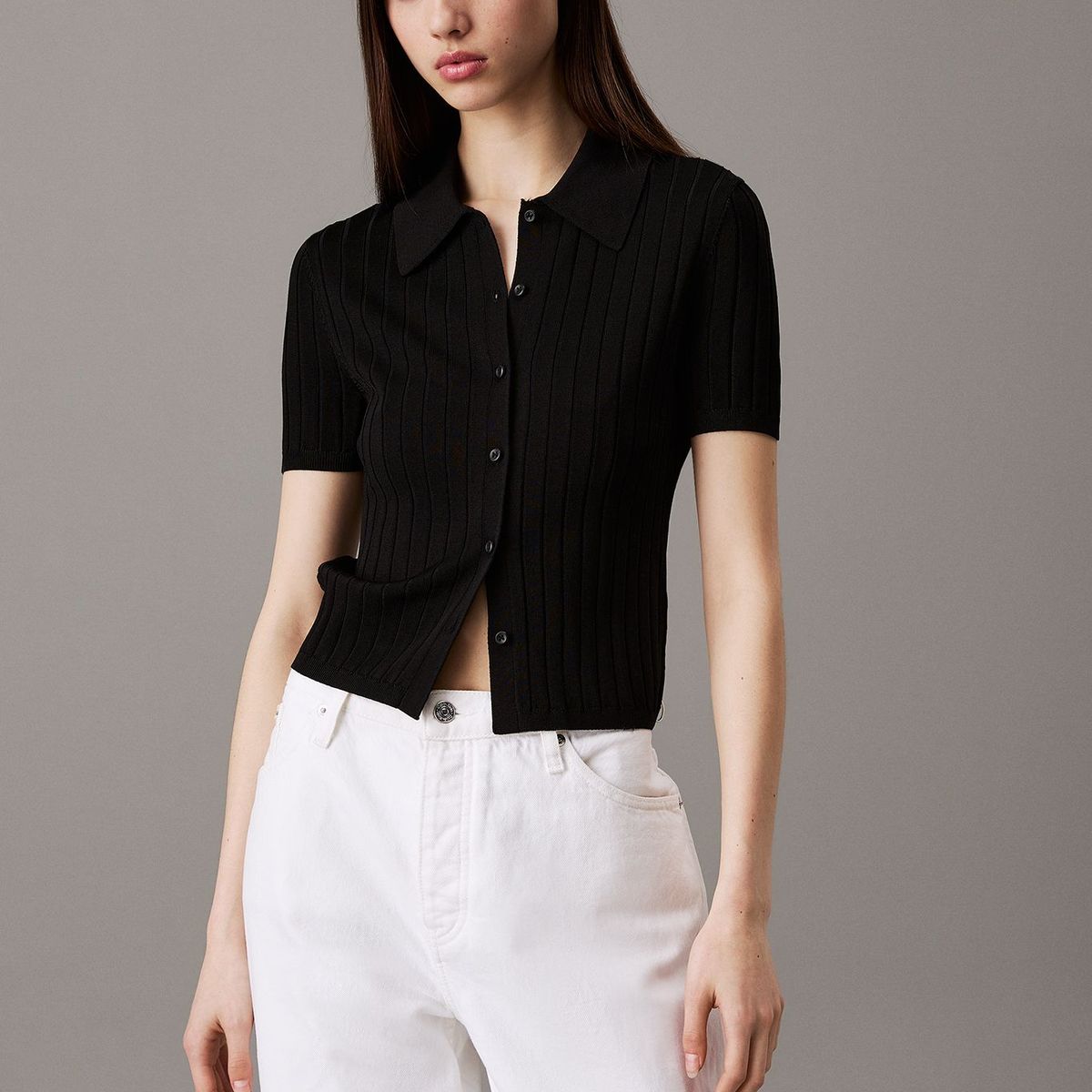 CALVIN KLEIN - Top negro tipo polo cropped de punto liso Calvin Klein