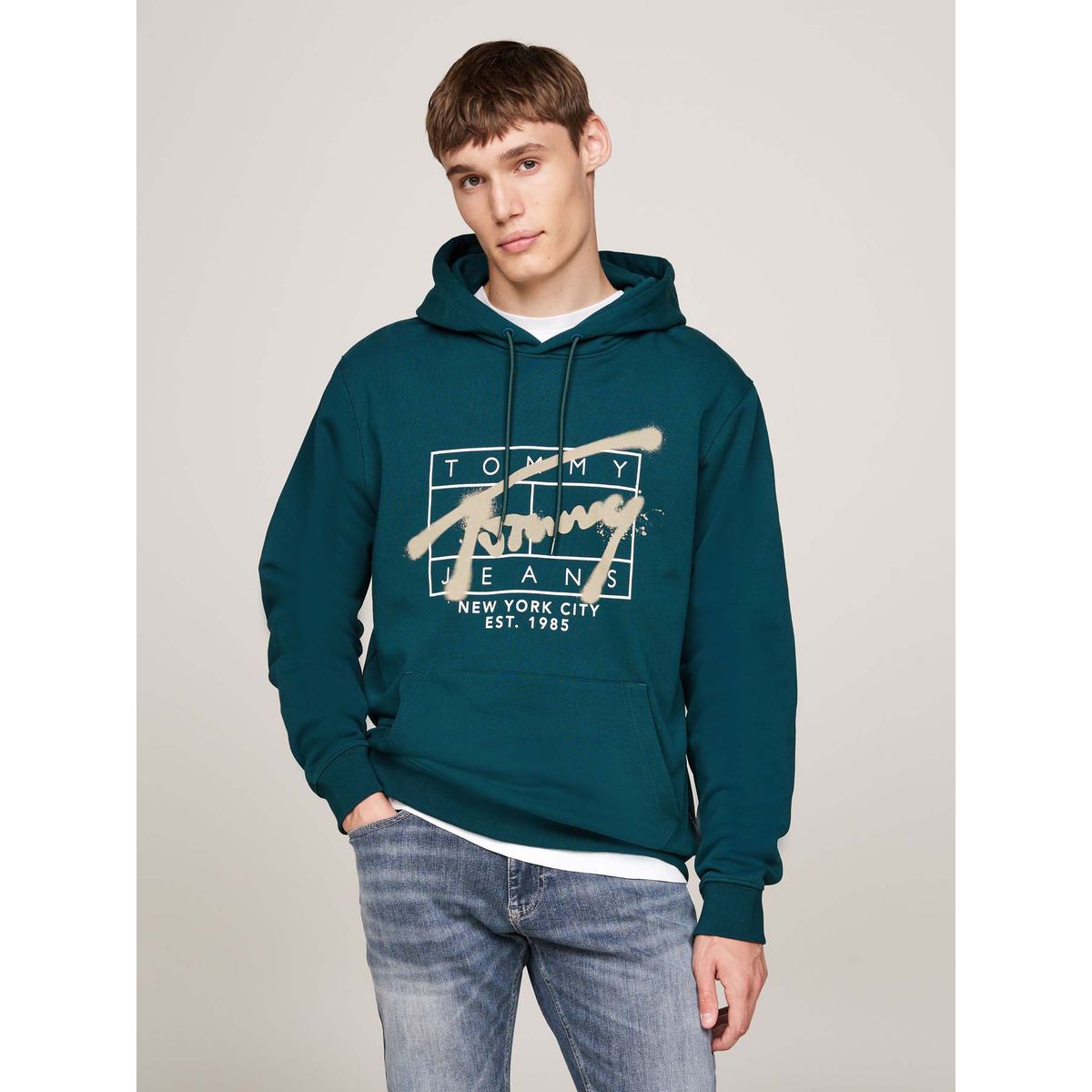 TOMMY HILFIGER - Buzo verde con logo distintivo estilo graffiti Tommy Jeans