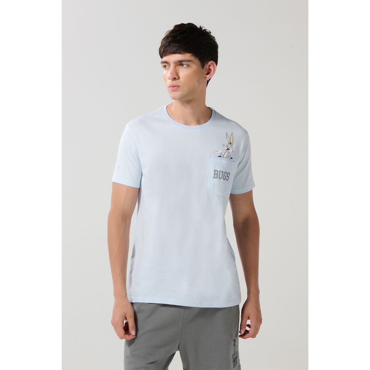 KOAJ - KOAJ Camiseta azul de Looney Tunes con bolsillo y manga cort Hombre