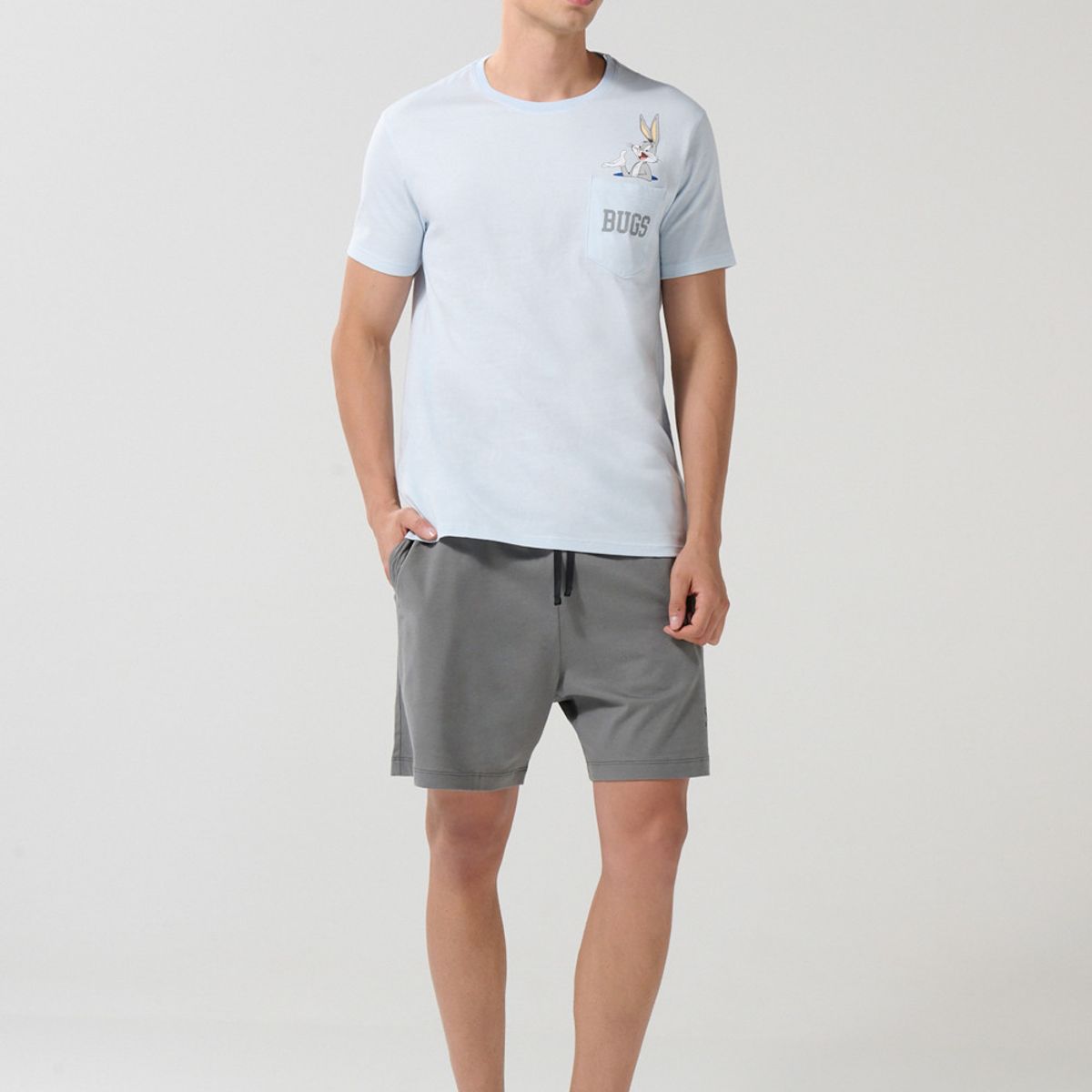 KOAJ - KOAJ Camiseta azul de Looney Tunes con bolsillo y manga cort Hombre