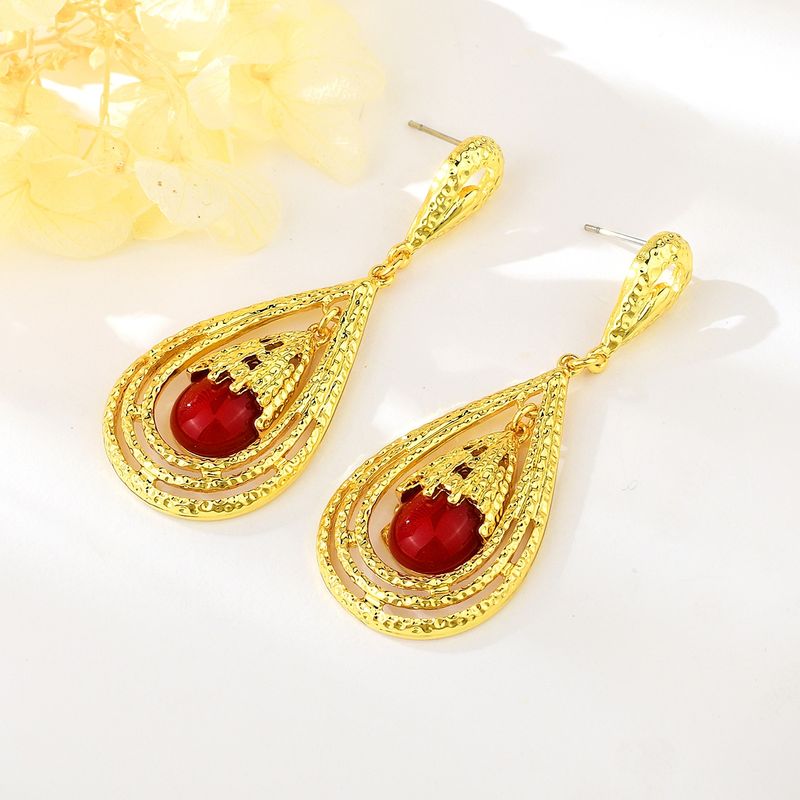VERAMOREST - Aretes largos dorados  – Veramorest
