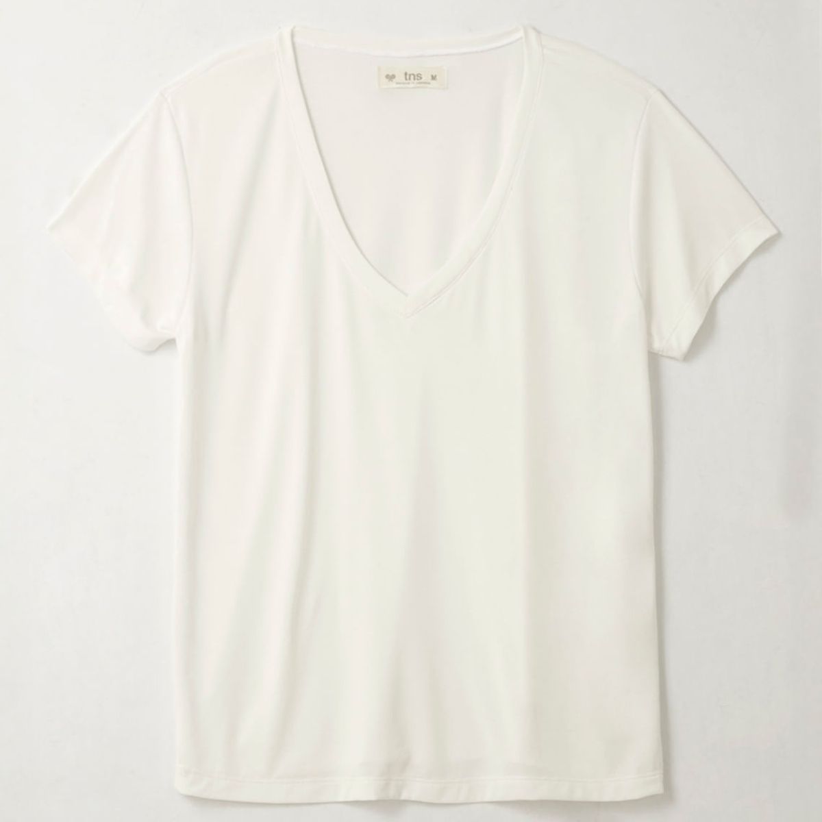 TENNIS - Camiseta con cuello en V cruda para mujer