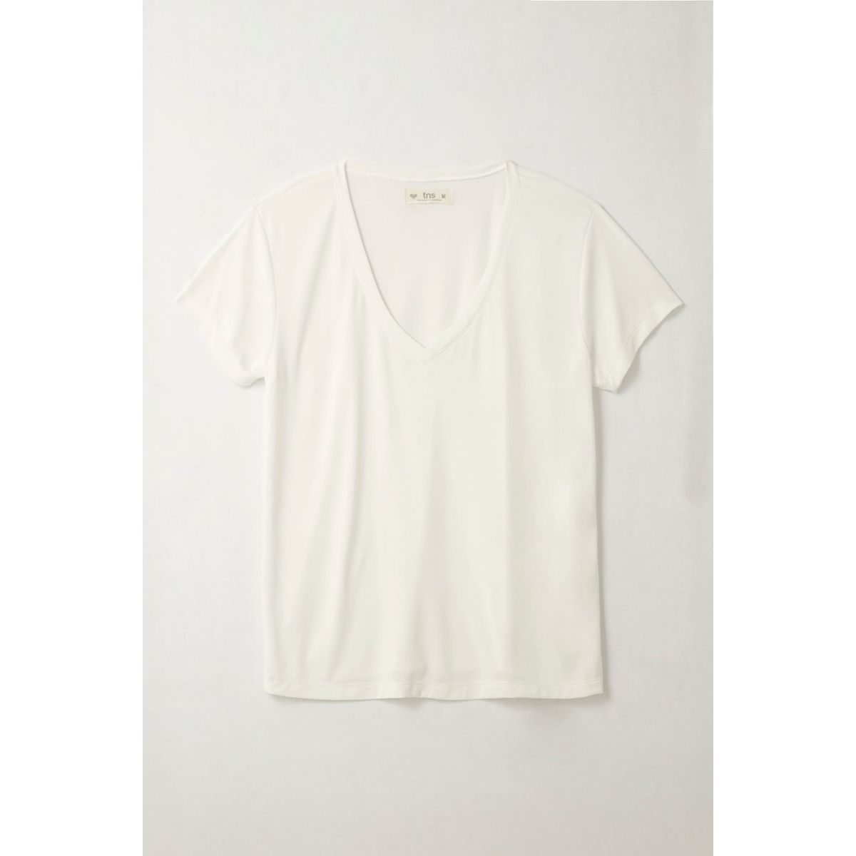 TENNIS - Camiseta con cuello en V cruda para mujer