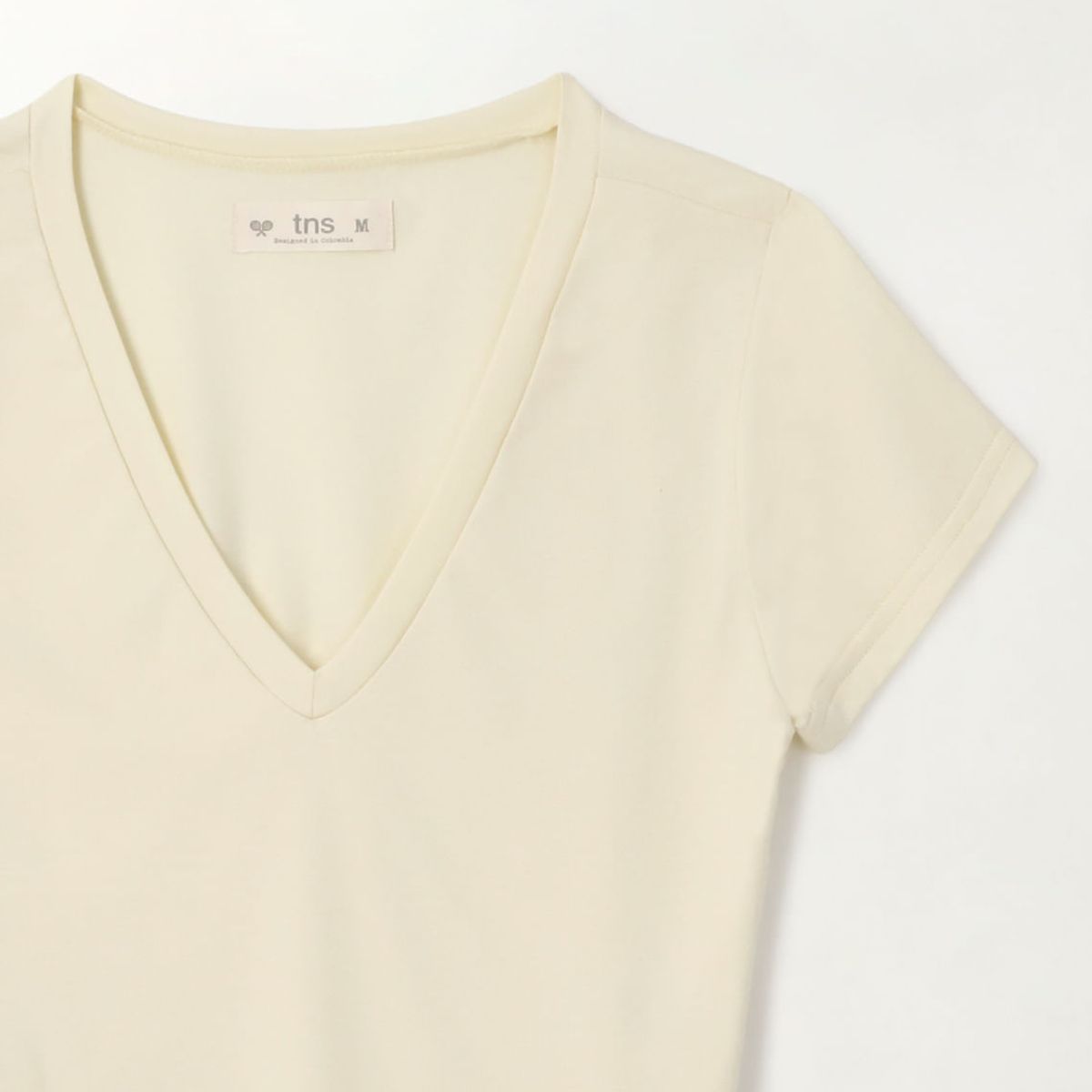 TENNIS - Camiseta crop con cuello en V amarilla para mujer