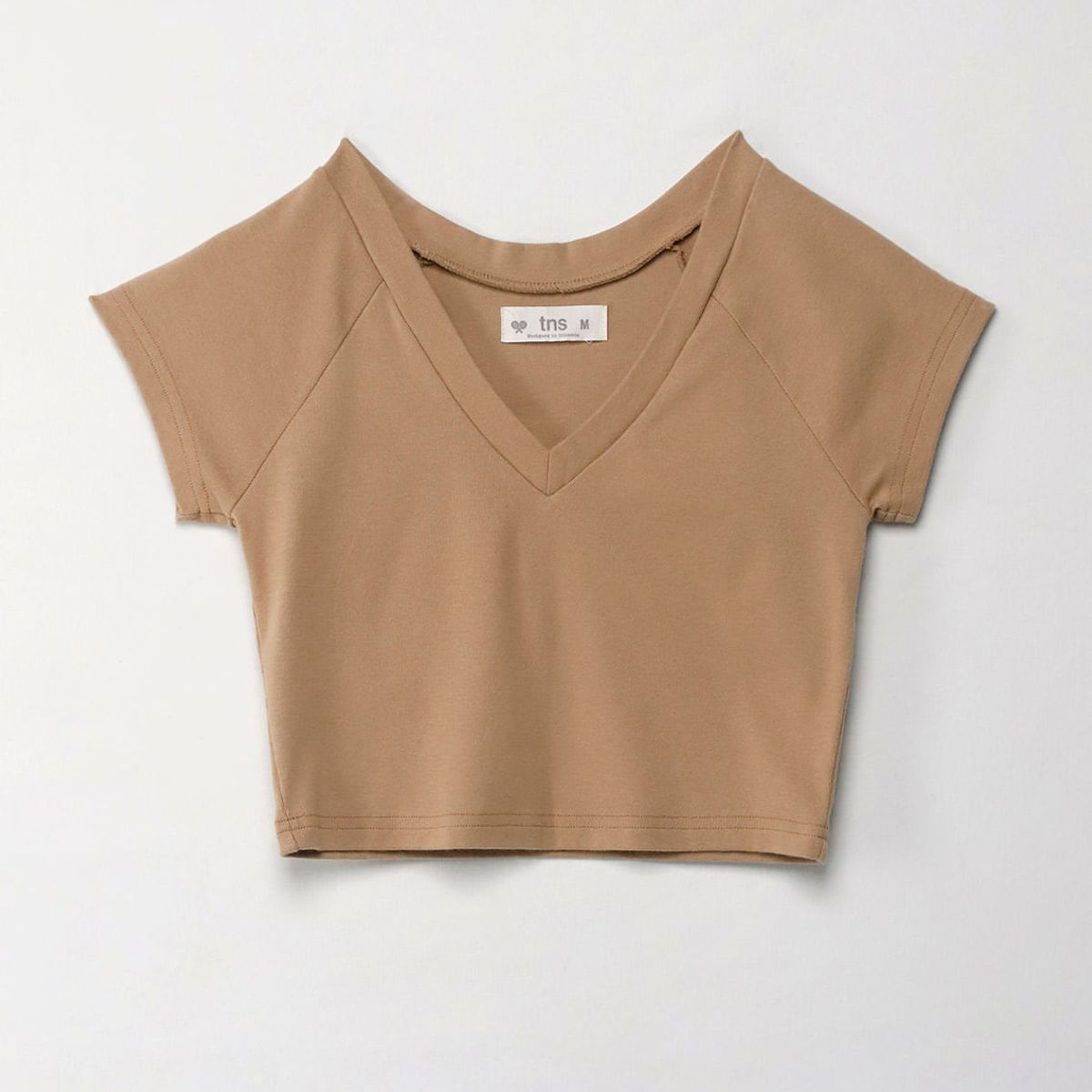 TENNIS - Camiseta crop con escote en V crudo para mujer