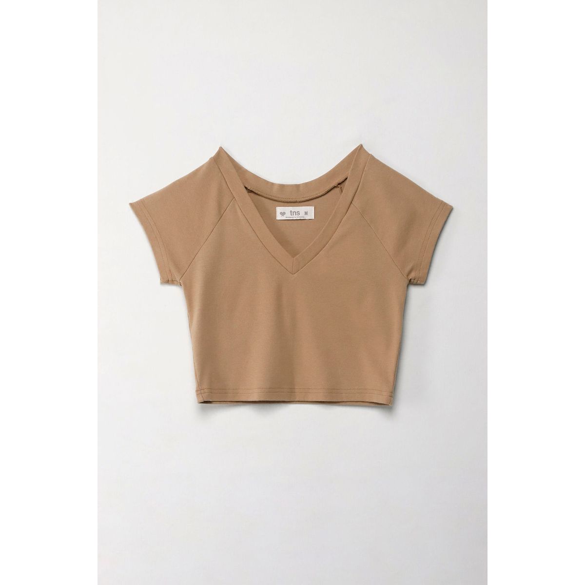 TENNIS - Camiseta crop con escote en V crudo para mujer
