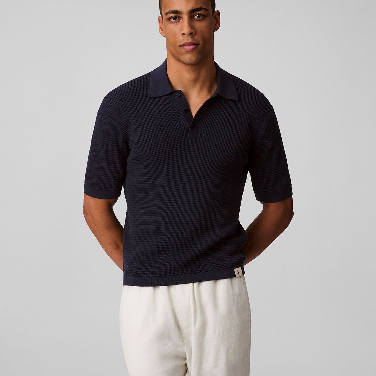 CALVIN KLEIN - Polo azul de algodón con efecto waffle Calvin Klein