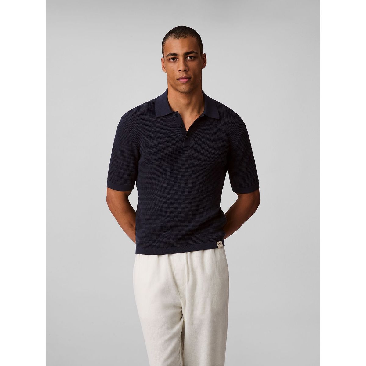CALVIN KLEIN - Polo azul de algodón con efecto waffle Calvin Klein