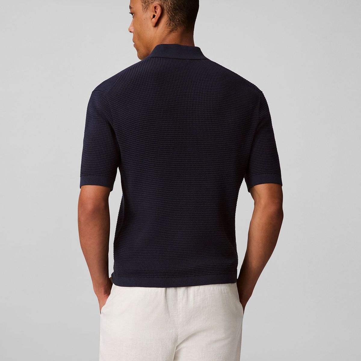 CALVIN KLEIN - Polo azul de algodón con efecto waffle Calvin Klein