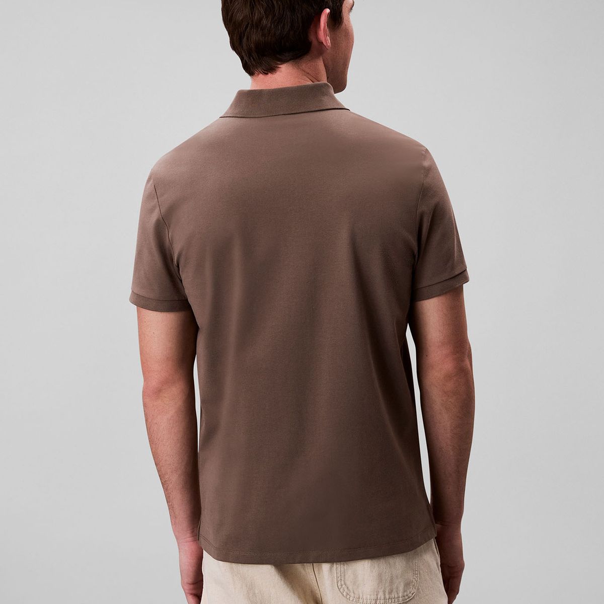 CALVIN KLEIN - Polo chocolate con monograma bordado Calvin Klein