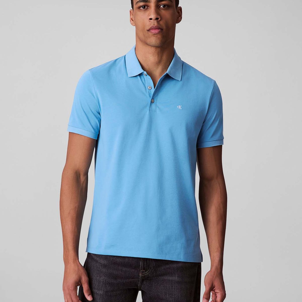 CALVIN KLEIN - Polo celeste con monograma bordado Calvin Klein