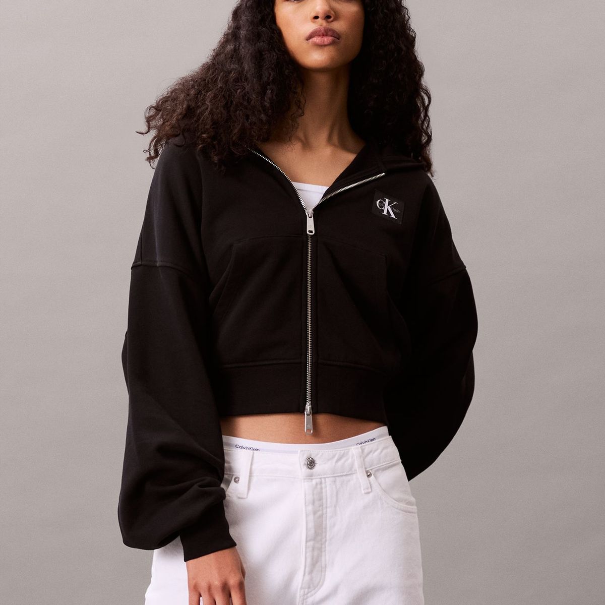 CALVIN KLEIN - Buzo negro con cremallera Calvin Klein