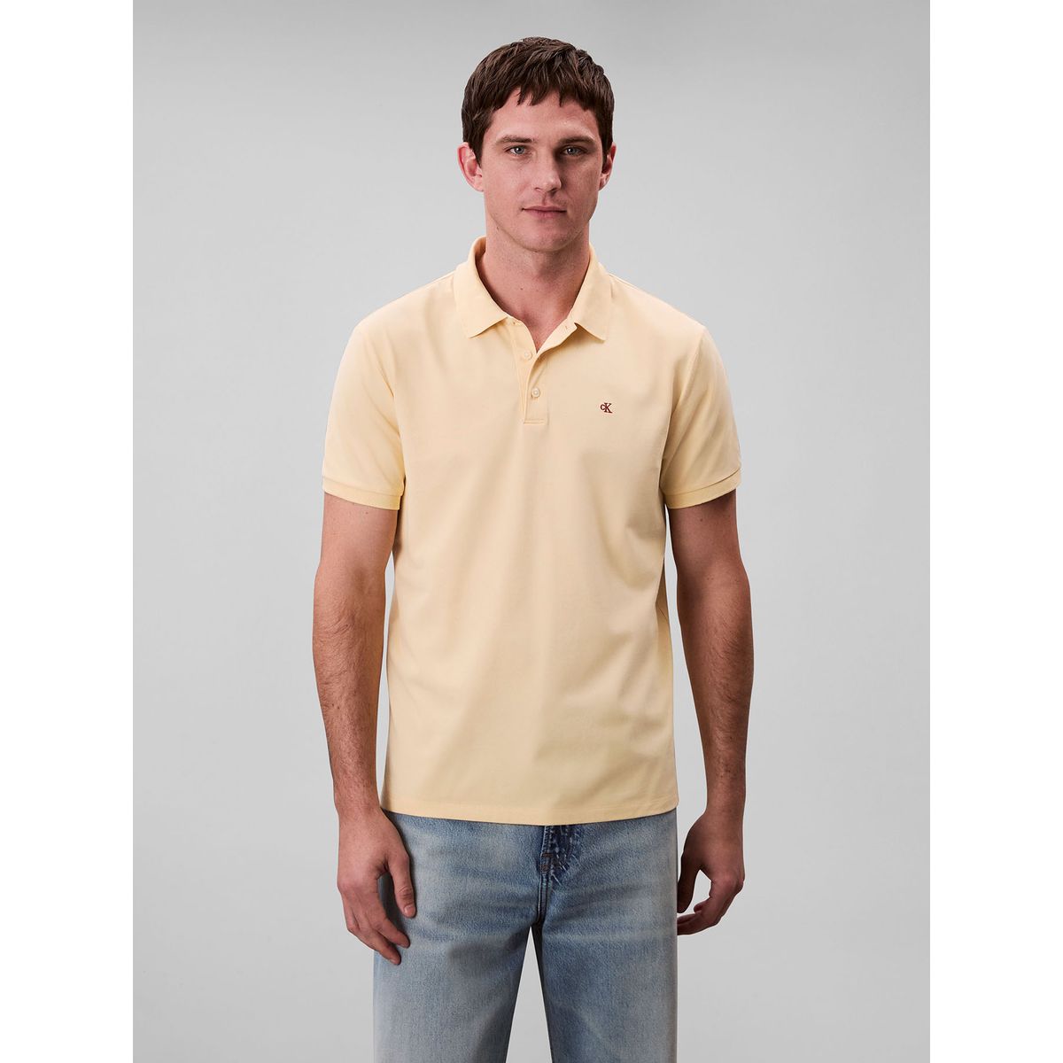 CALVIN KLEIN - Polo amarillo con monograma bordado Calvin Klein