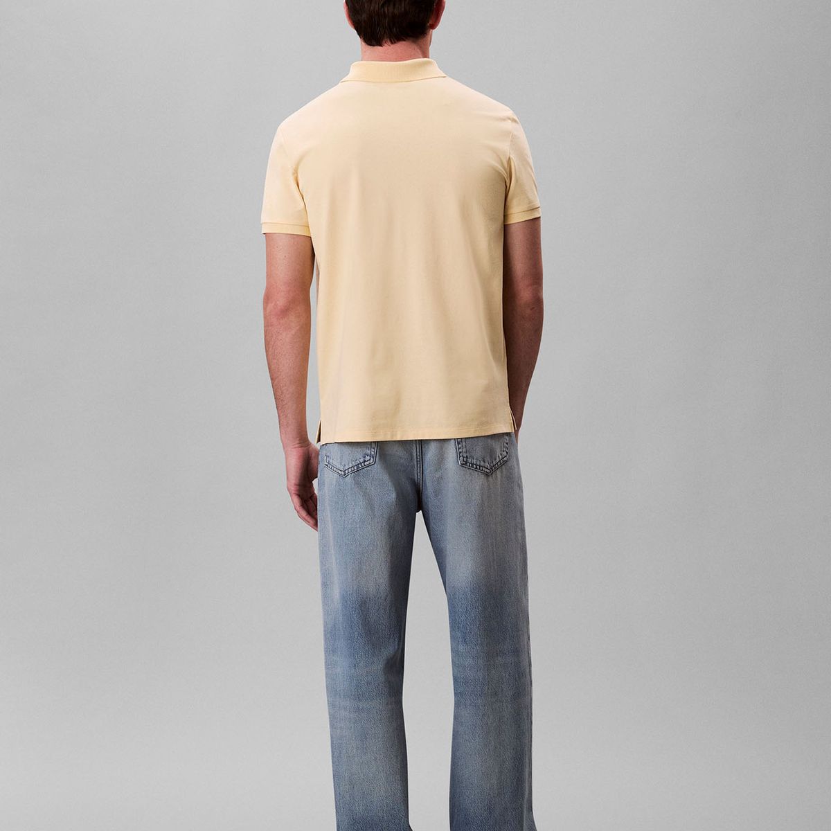 CALVIN KLEIN - Polo amarillo con monograma bordado Calvin Klein