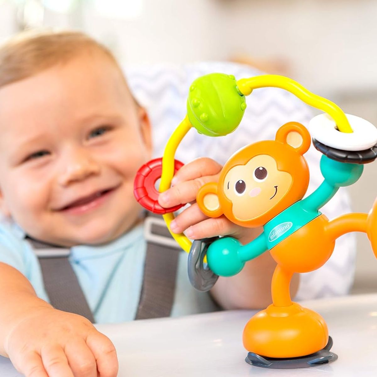 INFANTINO - Juego Sensorial Bebés Giratorio Mono Colores Adherible