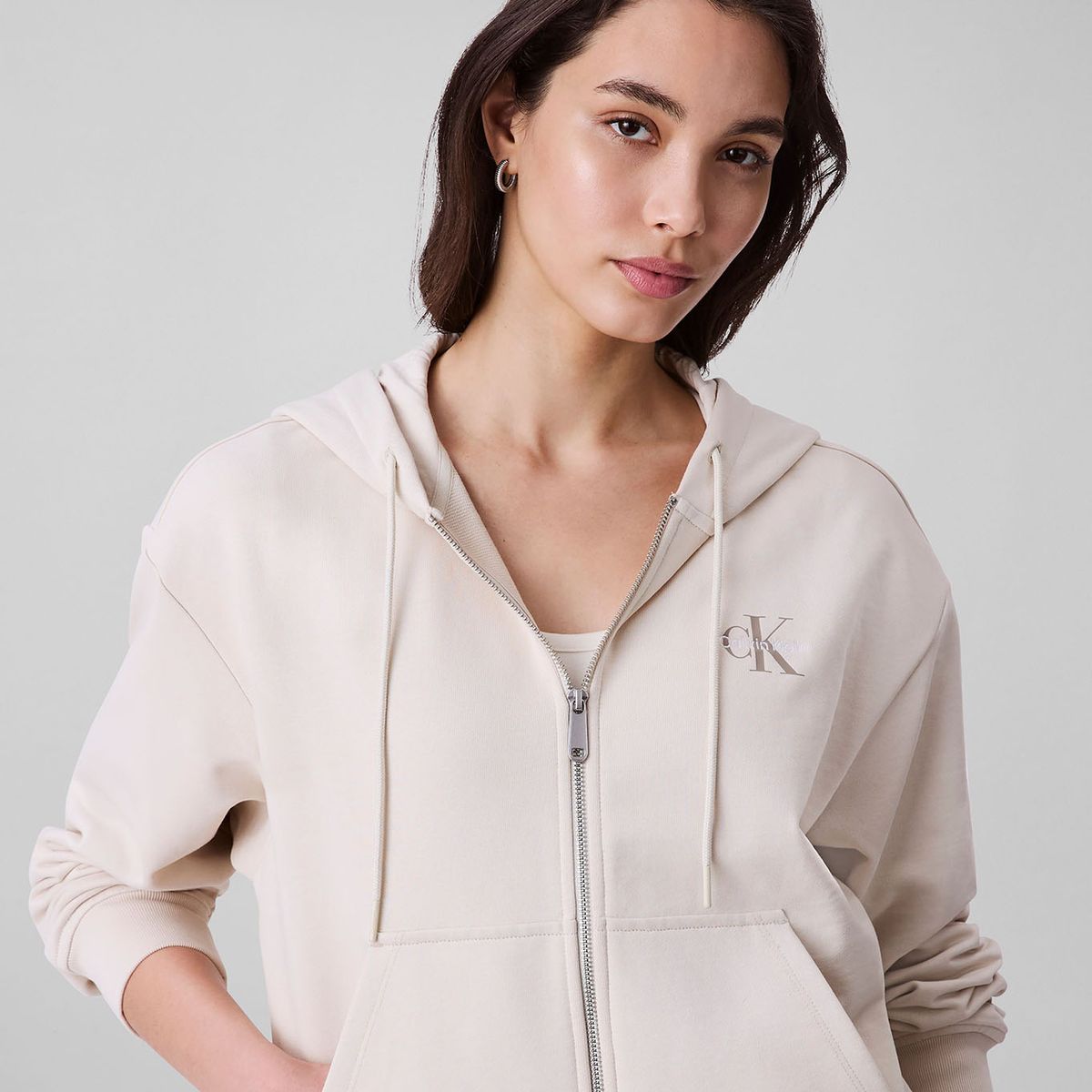 CALVIN KLEIN - Buzo beige con capota y cierre de cremallera Calvin Klein