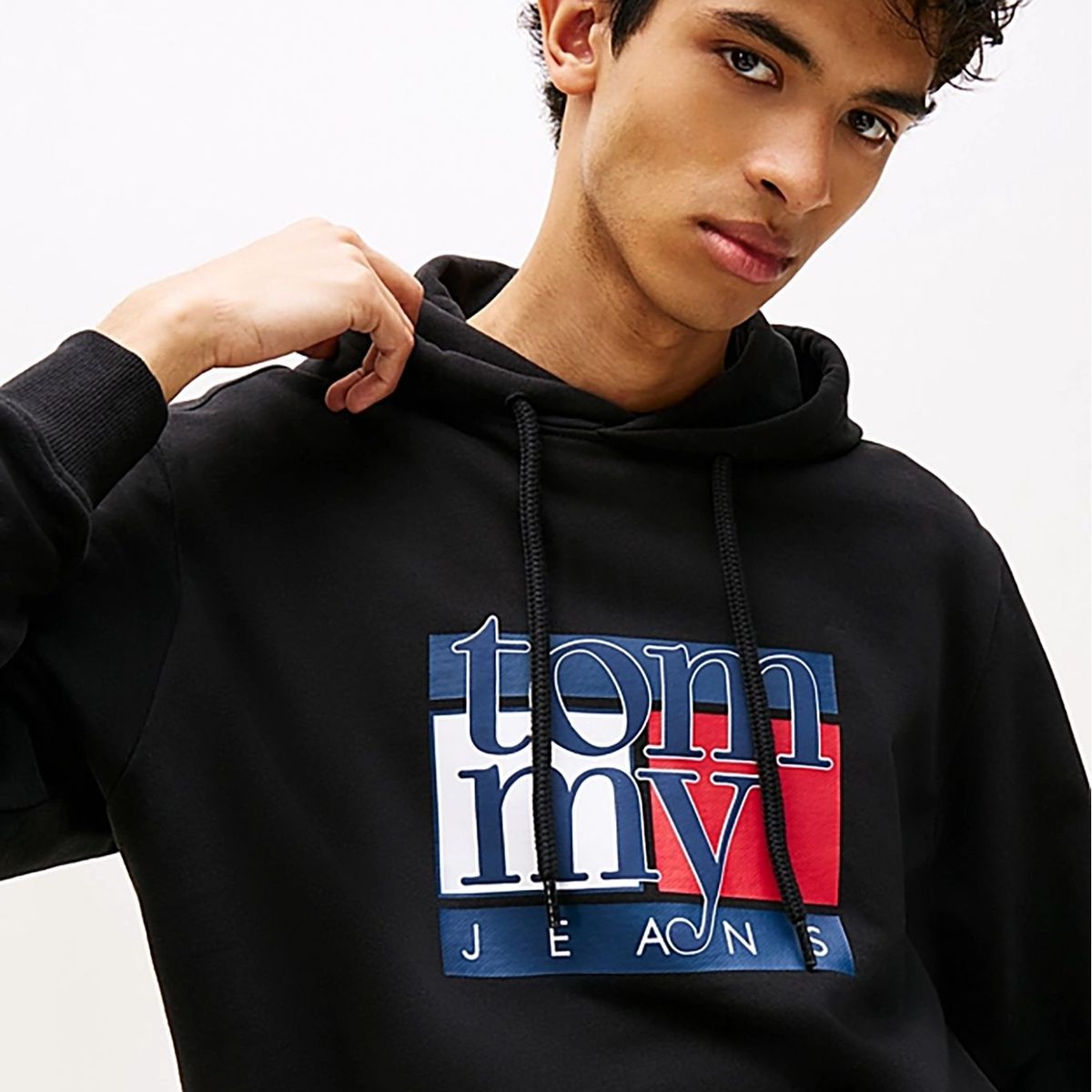 TOMMY HILFIGER - Buzo negro con capota y logo Tommy Jeans