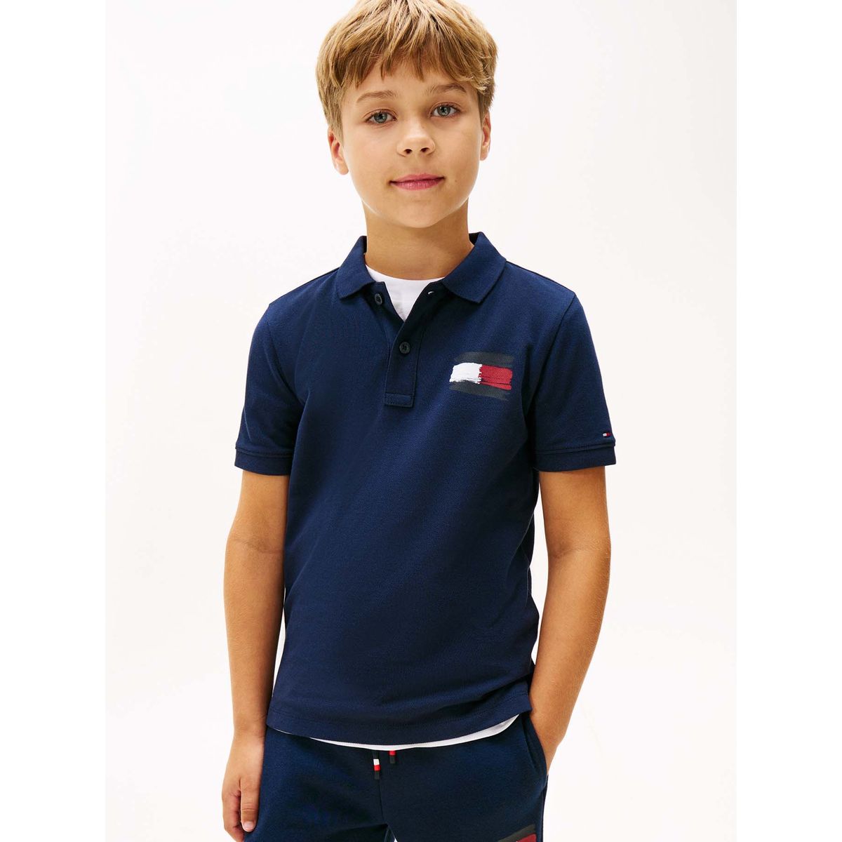 TOMMY HILFIGER - Polo azul con bandera bordada en el pecho Tommy Hilfiger