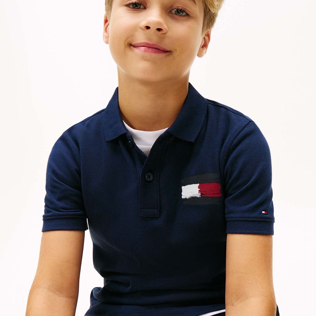 TOMMY HILFIGER - Polo azul con bandera bordada en el pecho Tommy Hilfiger