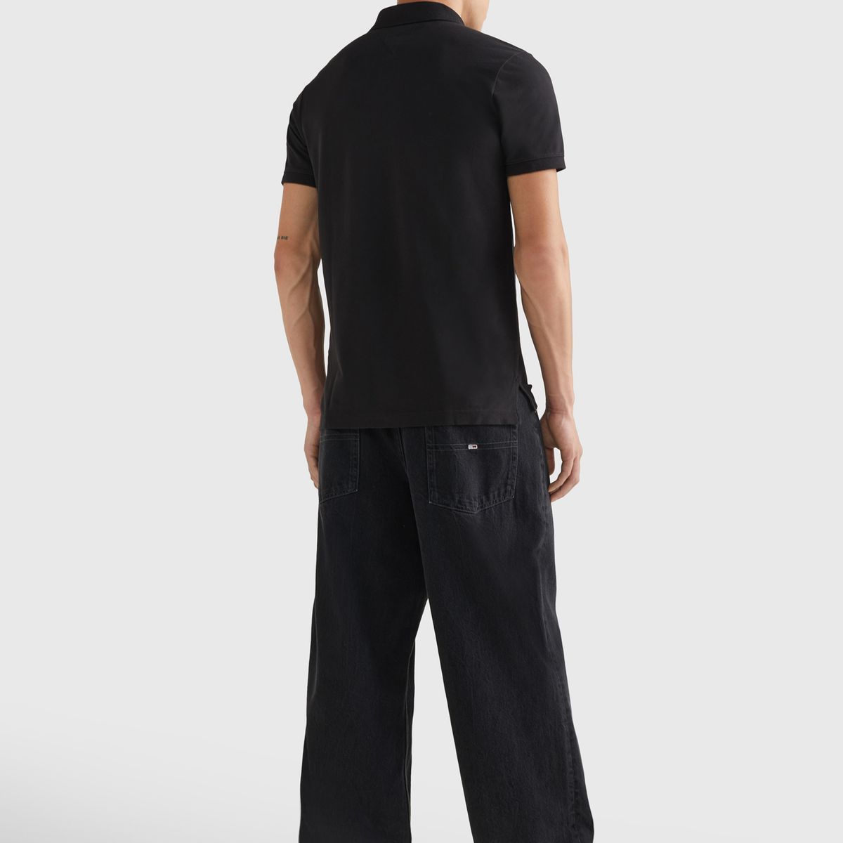 TOMMY HILFIGER - Polo negro de corte slim Tommy Jeans