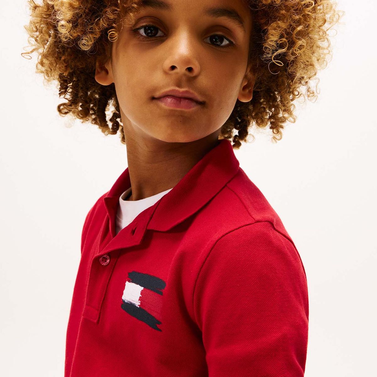 TOMMY HILFIGER - Polo rojo con bandera bordada en el pecho Tommy Hilfiger