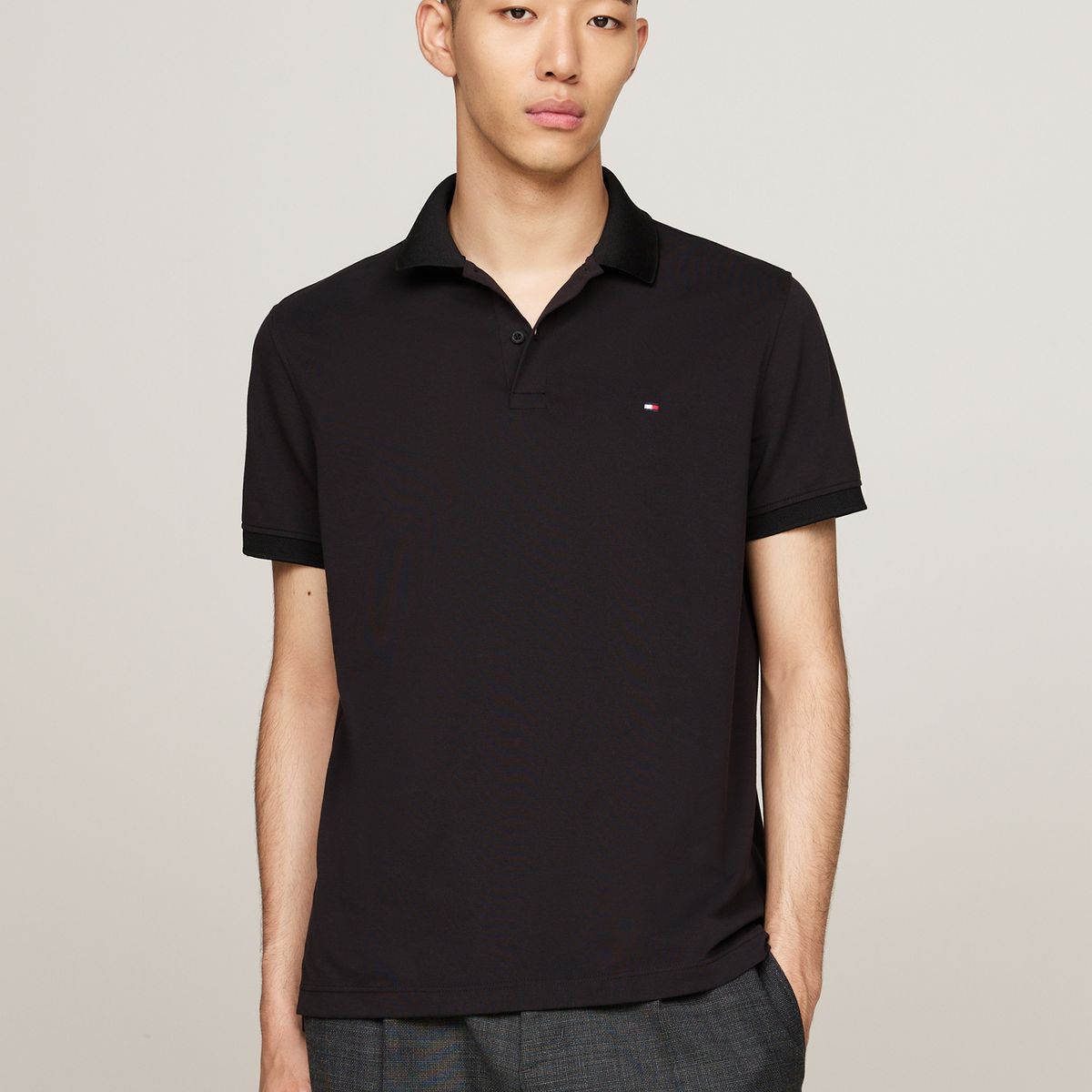 TOMMY HILFIGER - Polo negro TH Flex de corte regular Tommy Hilfiger