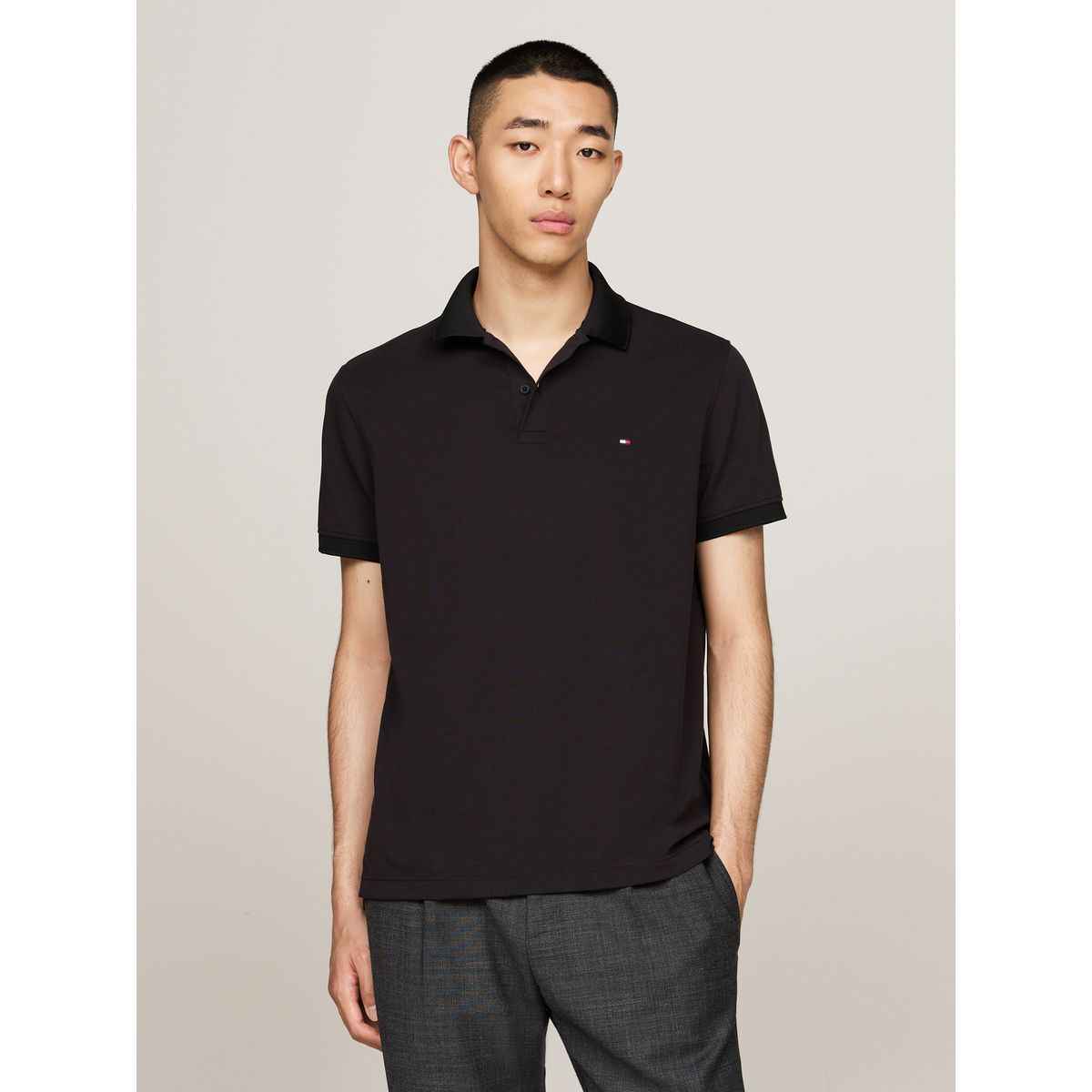 TOMMY HILFIGER - Polo negro TH Flex de corte regular Tommy Hilfiger