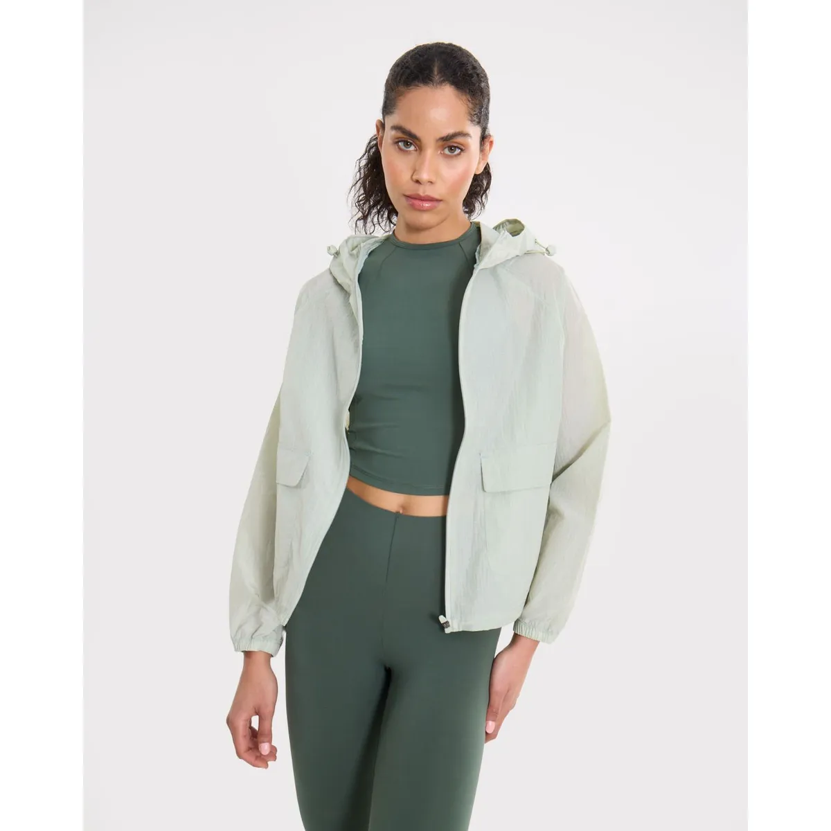 ATMOS - Chaqueta Rompevientos Con Capota Y Bolsillos  Para Mujer Verde Atmos