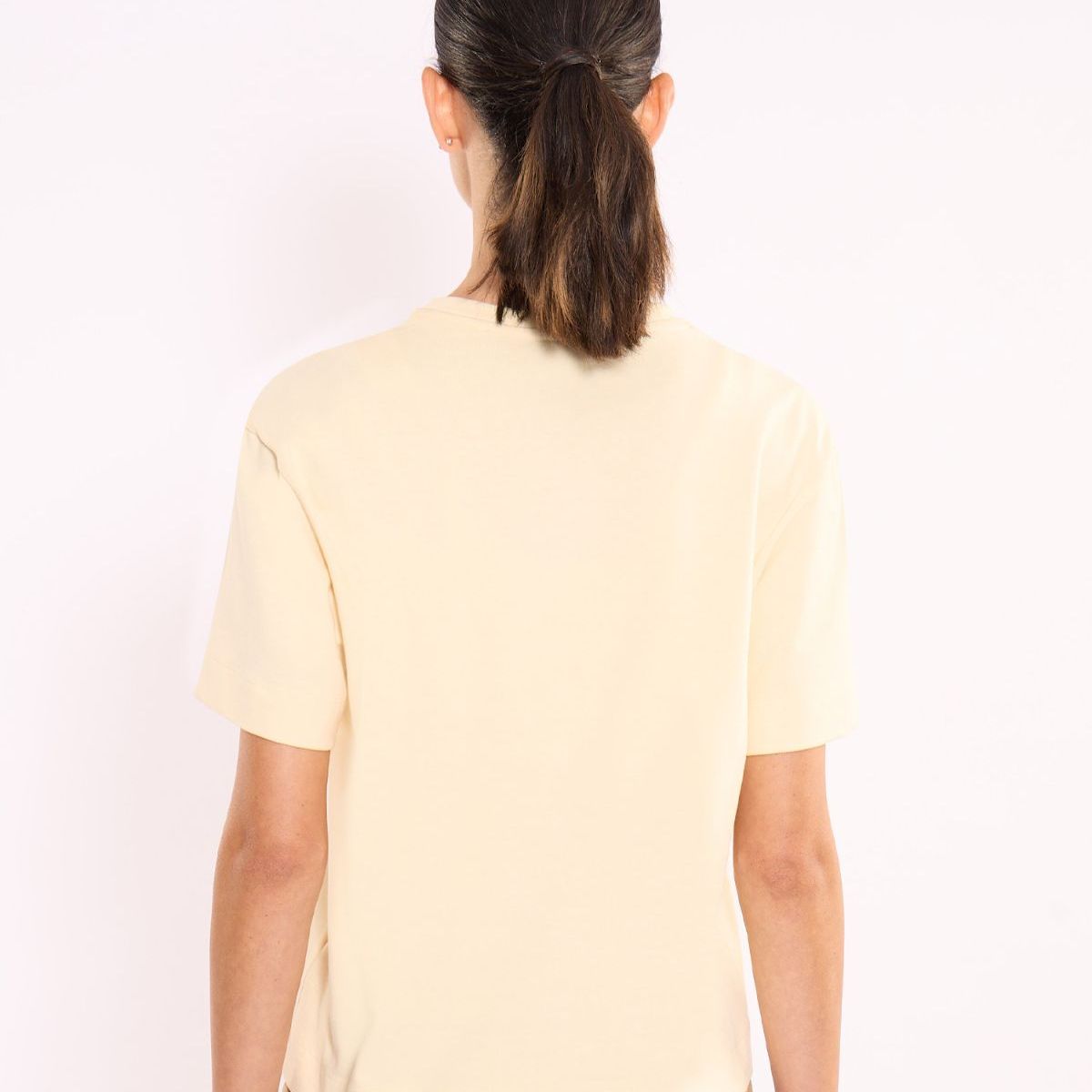 ATMOS - Camiseta Manga Corta Amplia Con Screen  Para Mujer Crema Atmos