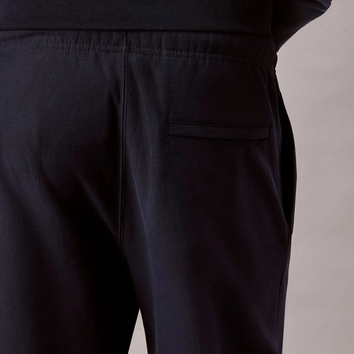 CALVIN KLEIN - Jogger azul en tejido terry premium con monograma bordado Calvin Klein