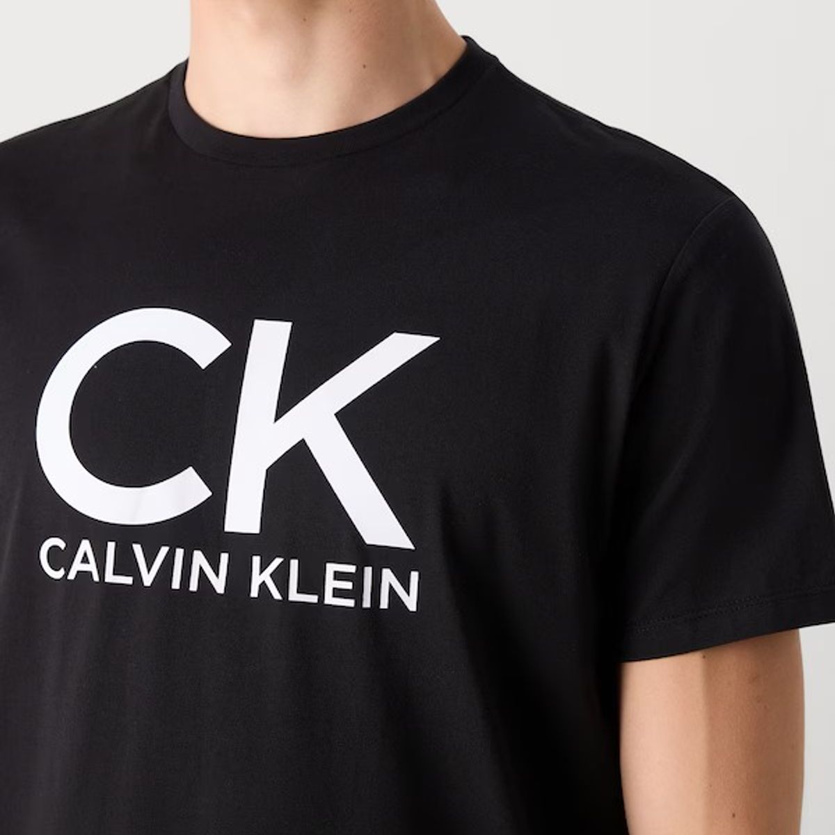 CALVIN KLEIN - Camiseta negra con estampado gráfico de monograma Calvin Klein