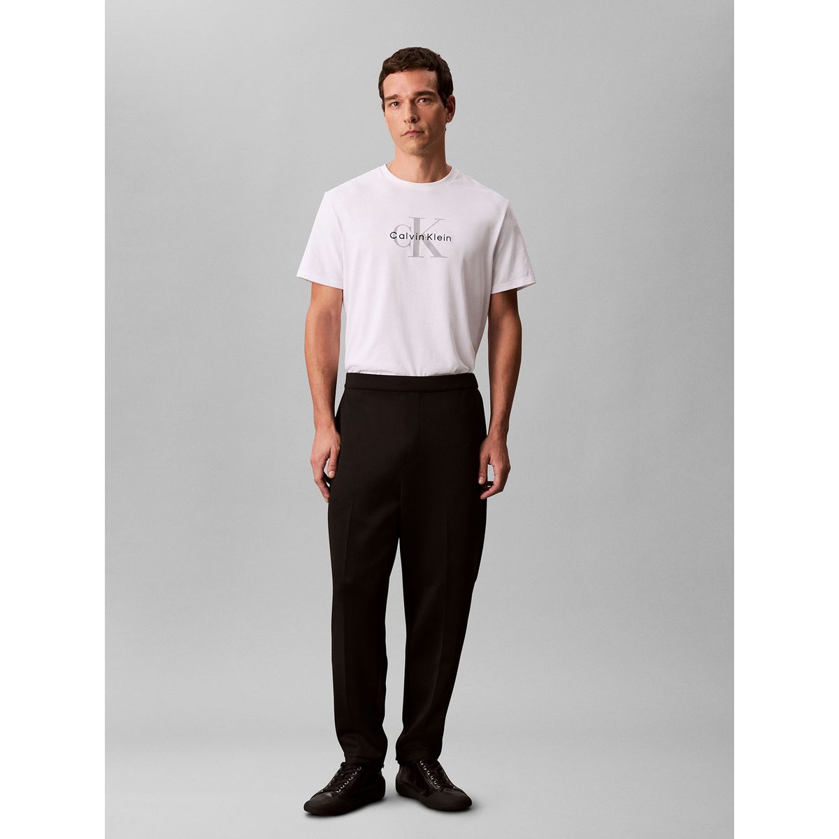 CALVIN KLEIN - Pantalón negro de tejido grueso de punto liso con cintura elástica Calvin Klein