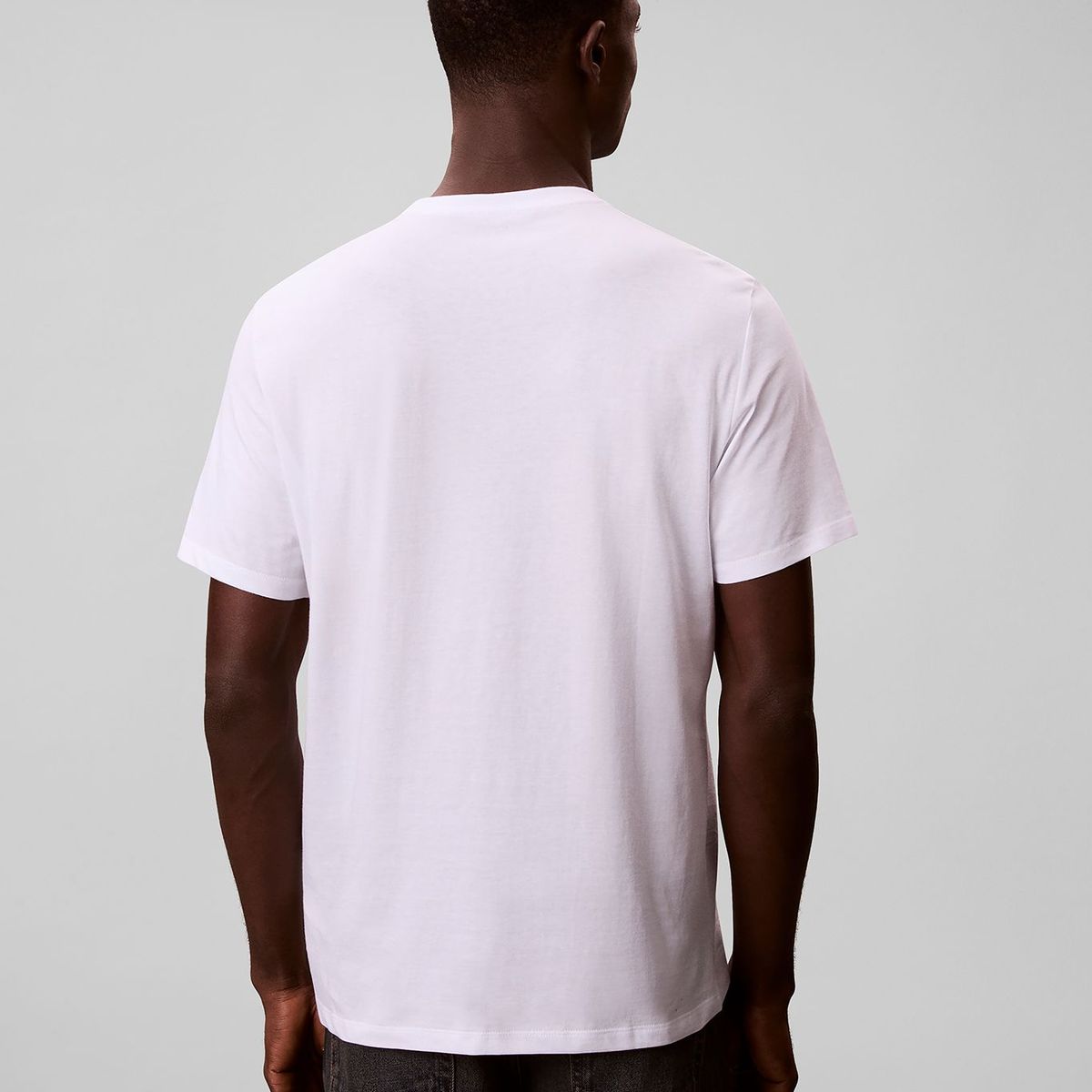 CALVIN KLEIN - Camiseta blanca con estampado gráfico de logo en estilo bold Calvin Klein