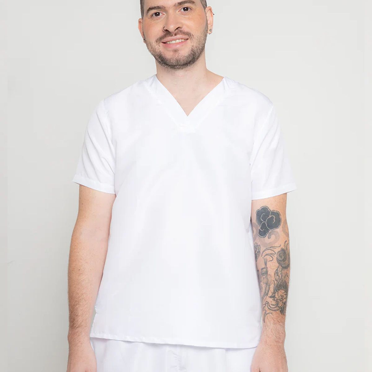 007PLUS - Uniforme en antifluido blanco sin bolsillos