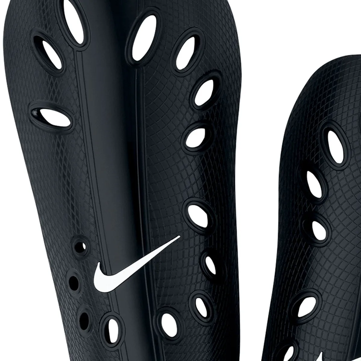 NIKE - Canilleras Nike