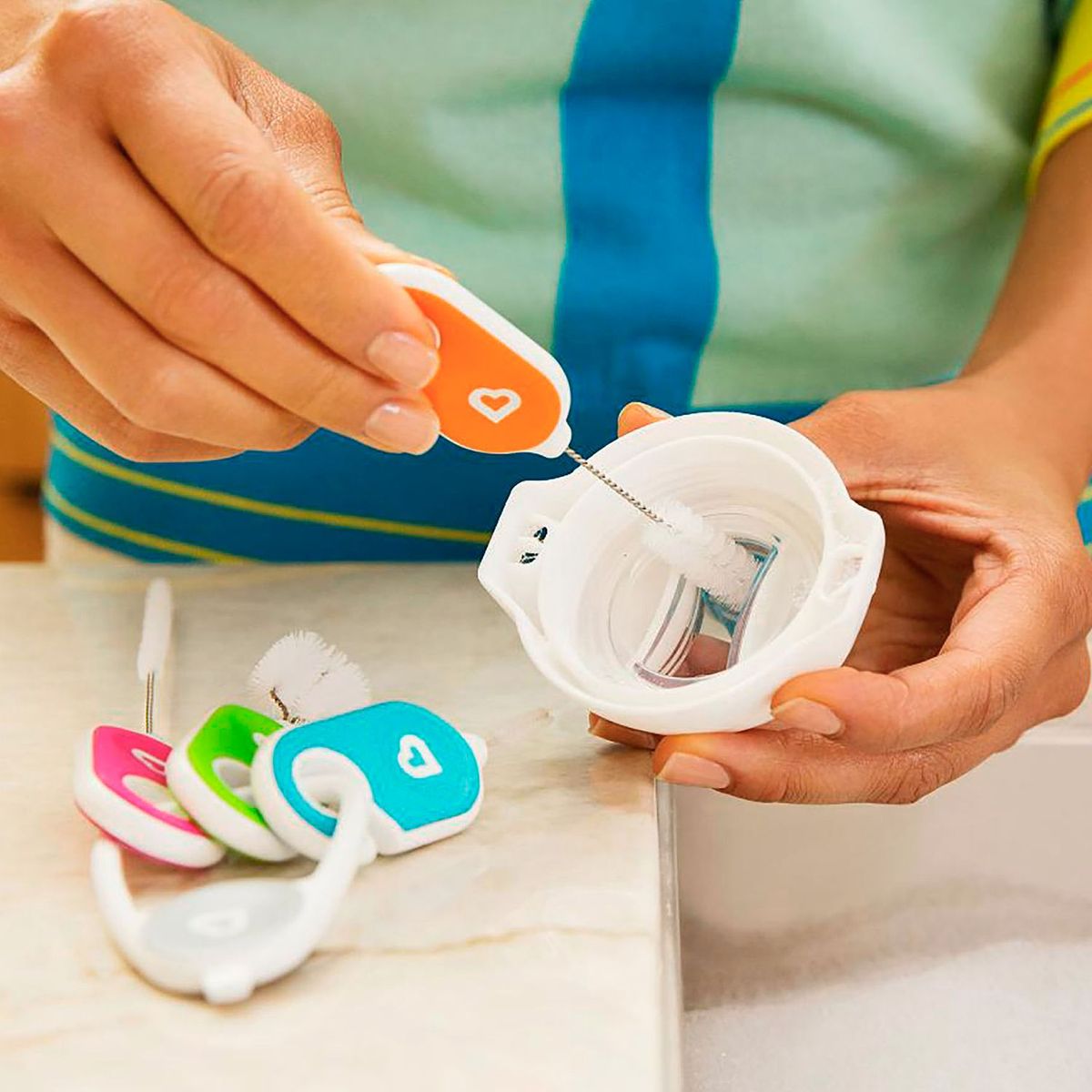 MUNCHKIN - Llavero Con Cepillos De Limpieza x4