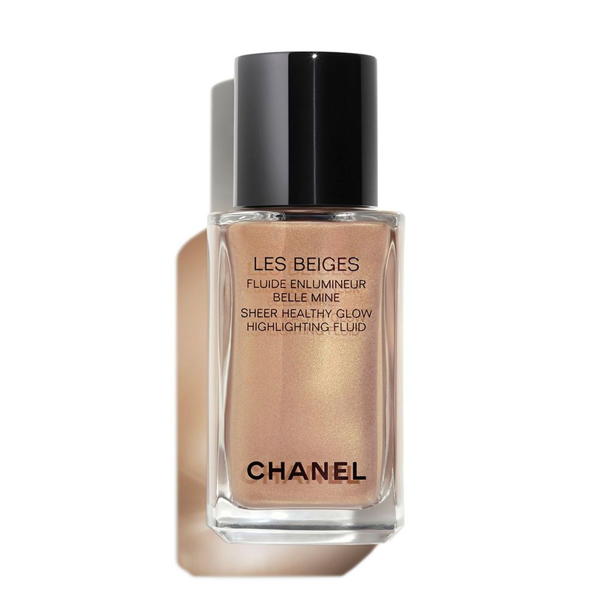 CHANEL - Chanel Les Beiges Fluido Iluminador Les Beiges Fluido Iluminador
Iluminador De Tez Efecto Irisado. Efecto Natural Luminoso. Rostro Y Cuerpo. Sunkissed 30Ml