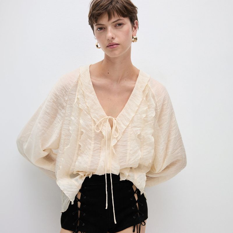 MANGO - Blusa Manga larga globo MANGO