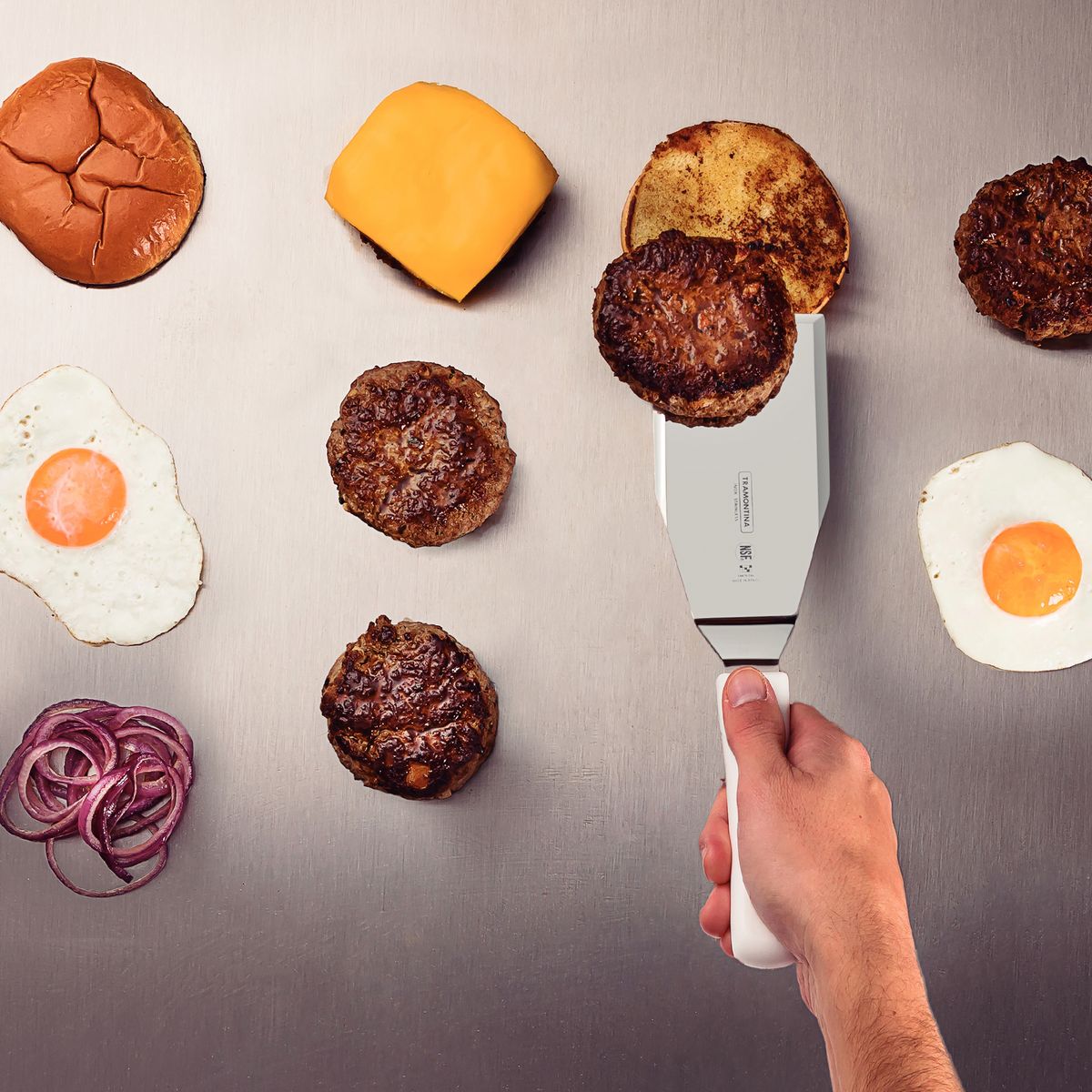 TRAMONTINA - Espátula 6x3" Tramontina Profesional de acero inoxidable y mango de polipropileno blanco