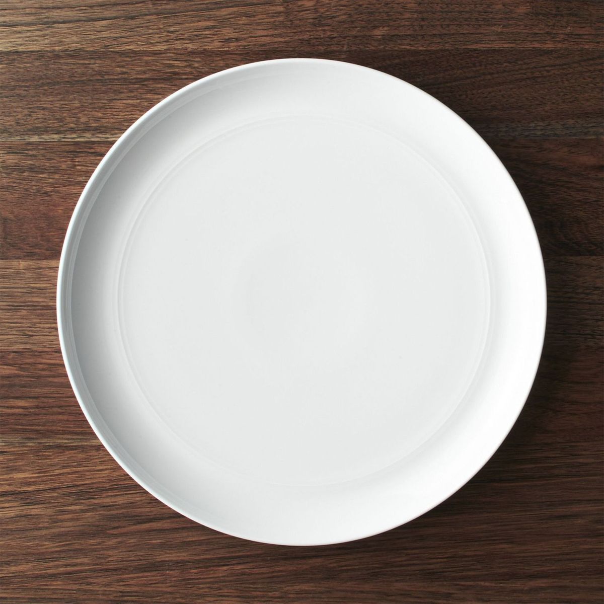 CRATE & BARREL - Plato Base Hue Blanco 30 cm. 