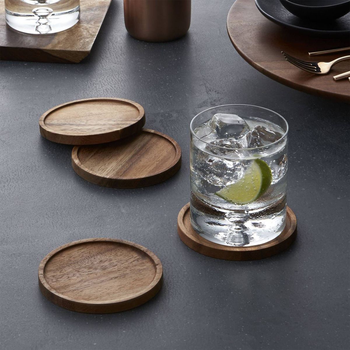 CRATE & BARREL - Portavasos Tondo en Madera de Acacia Set x 4