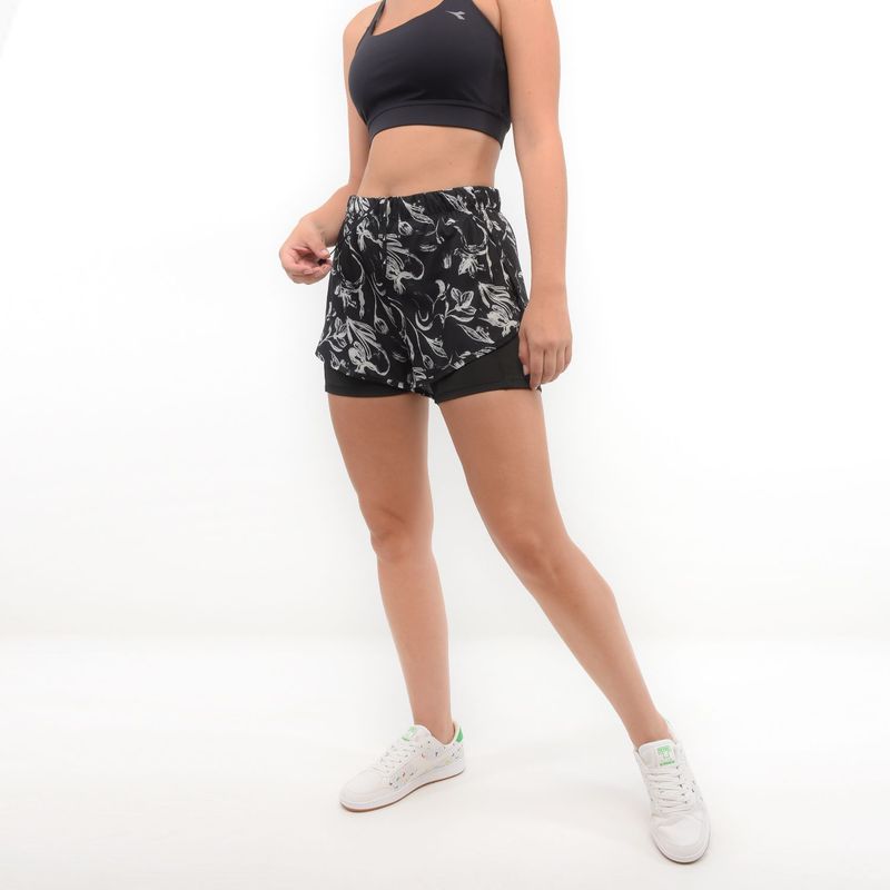 DIADORA - Pantaloneta con Biker para Mujer con Reflectivo y Bolsillo Diadora