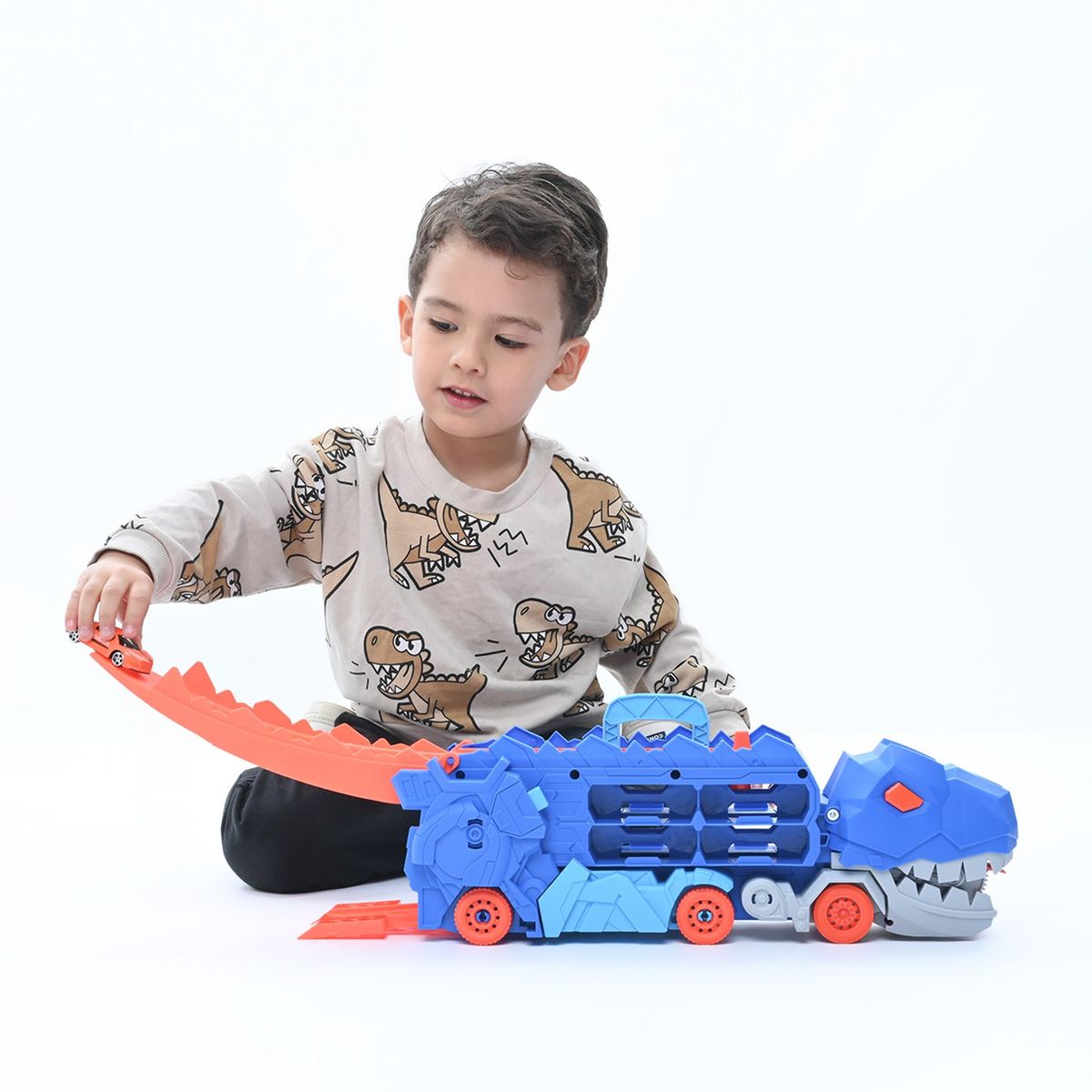 KIDS N PLAY - Maletín dinosaurio, set de carros de juguete. Incluye 2 autos de aluminio